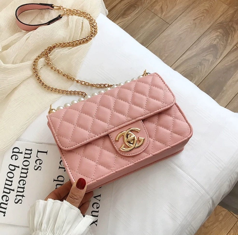 alt="Affordable Handbags to add in your collection"
