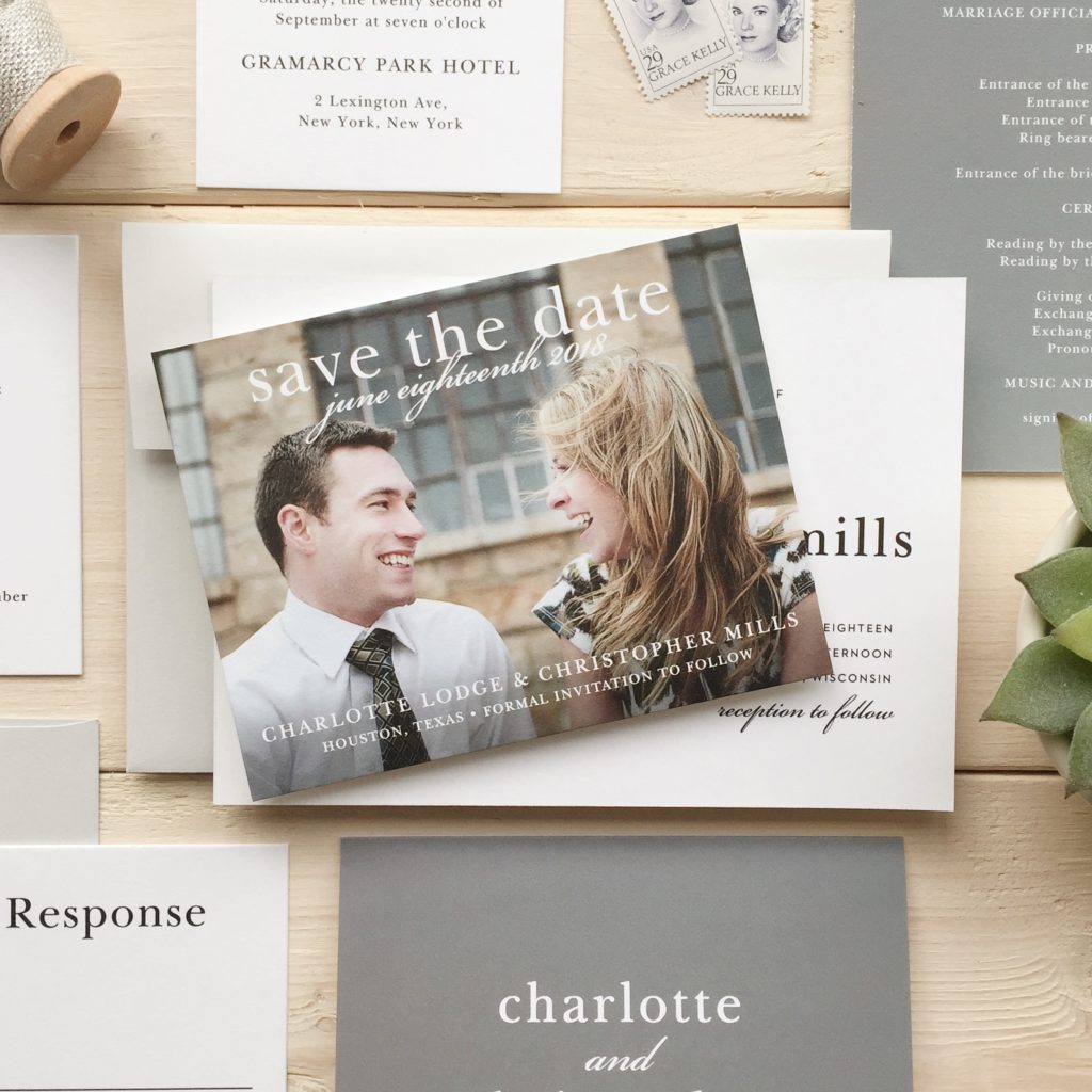 alt="Save the date postcards by Basic Invite"